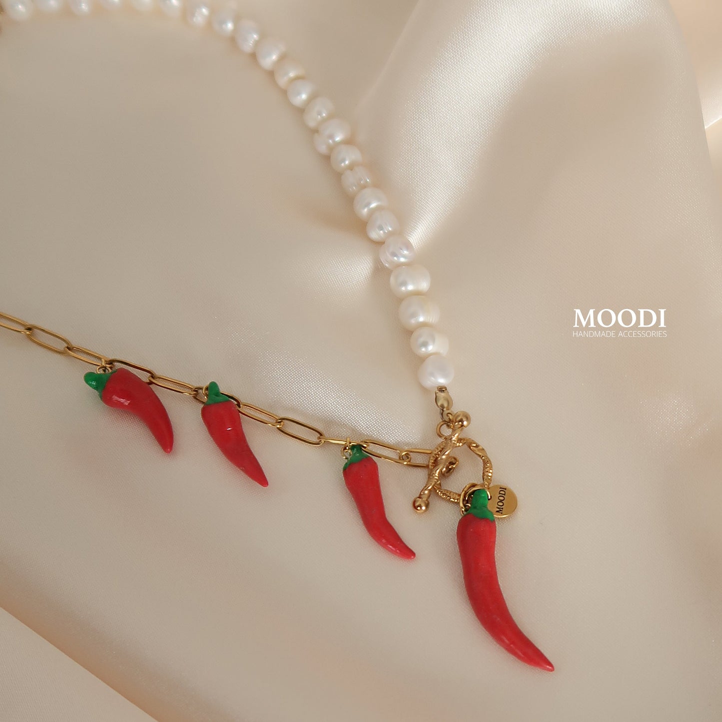 Be hot Necklace and Scarlet Muse brooch